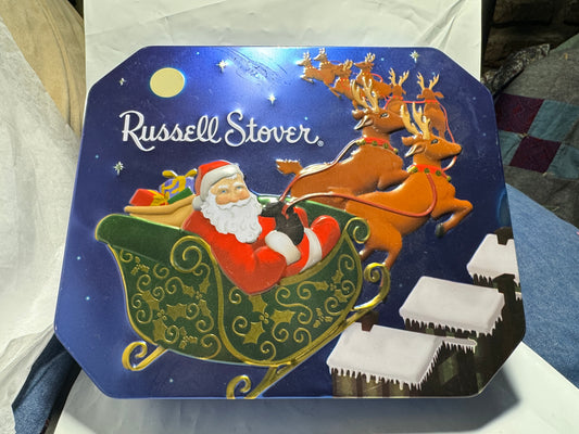 Russel Stover Assorted Chocolate Christmas Tin "Santa & His Reindeer".